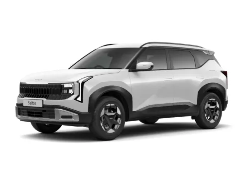 Front three-quarter view of a white Kia Seltos HTK variant against a white background, showing the trim-specific wheel covers and front fascia.